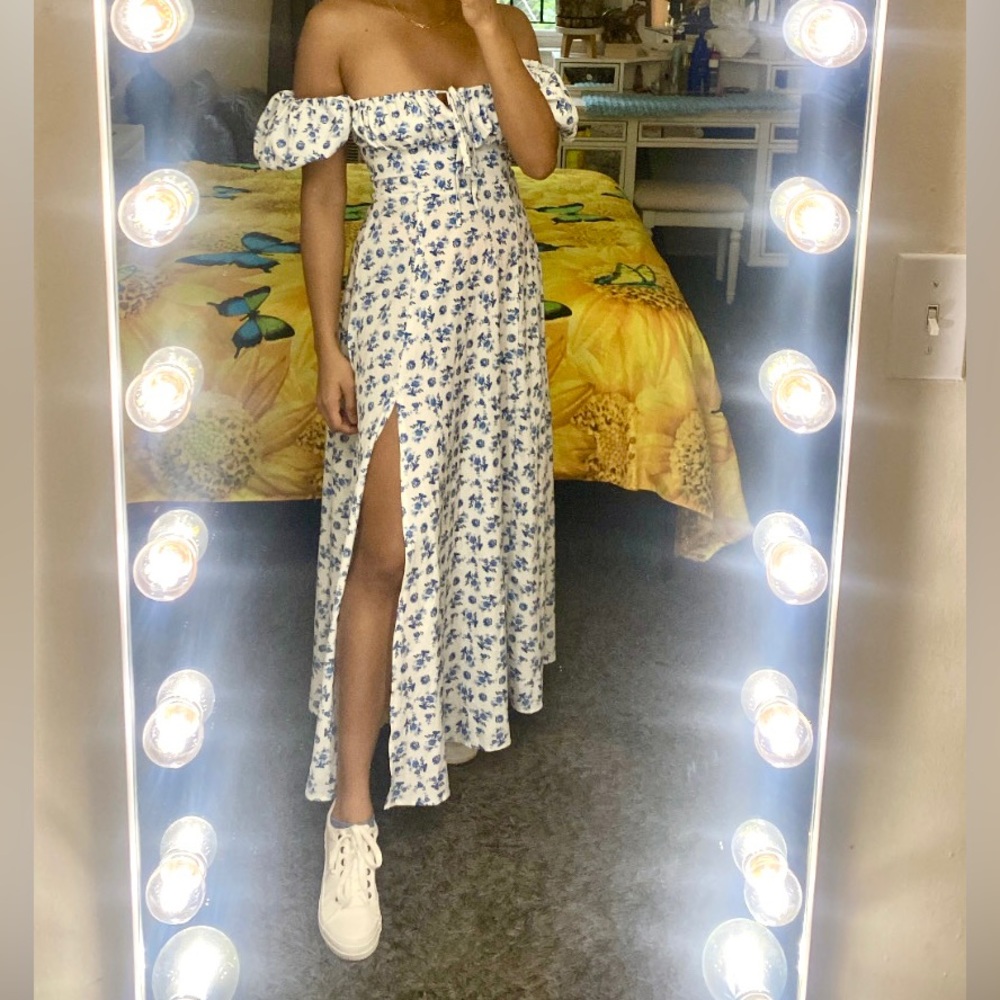 Long summer floral medium white and blue dress in good condition. Used once